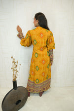 Embroidered Straight Cut Bandhani Kurti with Intricate Traditional Detailing